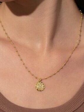 Uncommon James Coin necklace